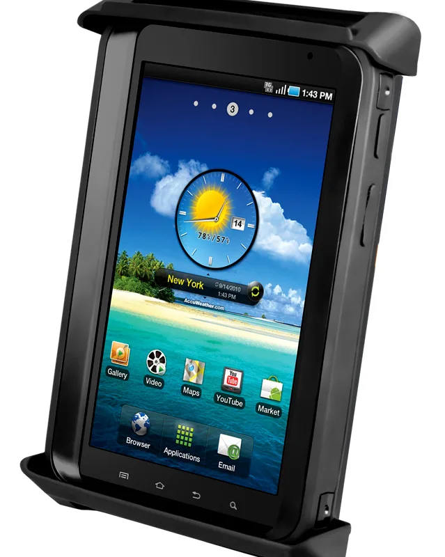 Rugged black Android smartphone in a heavy-duty case resting in a docking cradle, showing beach wallpaper and app icons on screen