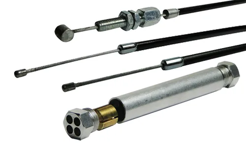 Assortment of metal control cables with ball-end and threaded fittings alongside a metallic hydraulic actuator with a hex nut end cap.